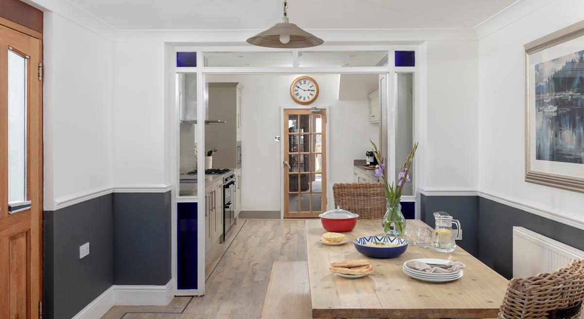 Tuck into a hearty meal around the dining table.