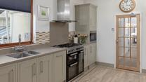 The large kitchen provides you with plenty of space to cook up a storm!