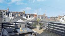 Enjoy a cold G and T on the outside decked terrace area.