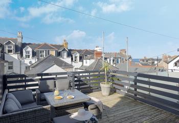 Enjoy a cold G and T on the outside decked terrace area.