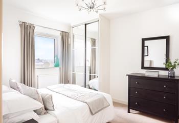 Bedroom 1 has the benefit of an en suite, offering everyone space and privacy to get ready.