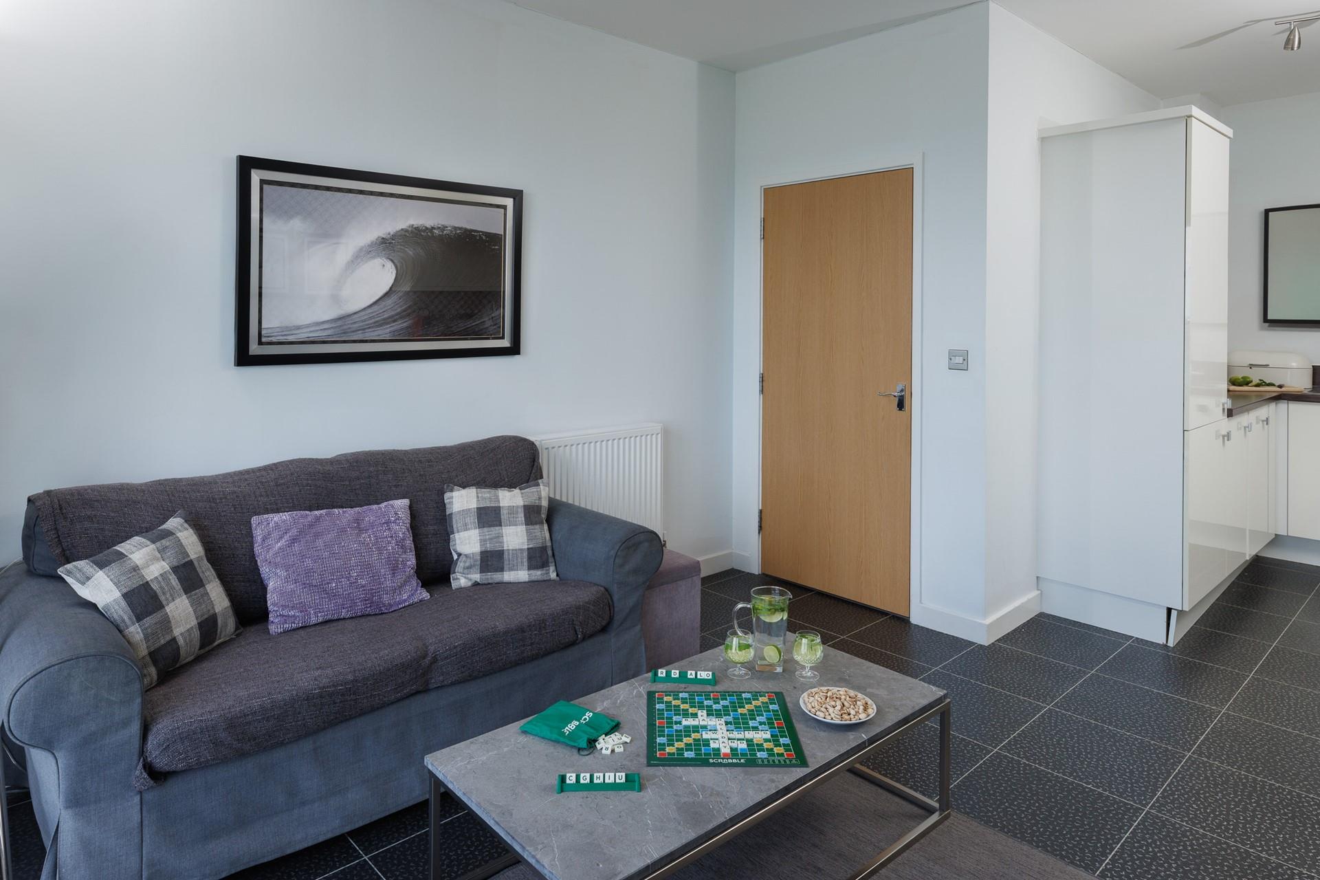 Minimalist style and modern amenities await in the open plan living area.