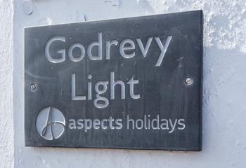 The property has a classic Aspects Holidays slate sign to help make it easy for guests to find their accommodation. 