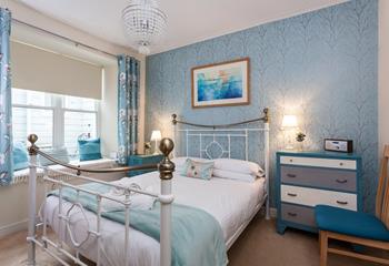Blues and creams bring the magic of the sea inside, providing a calming colour palette to relax before bed.