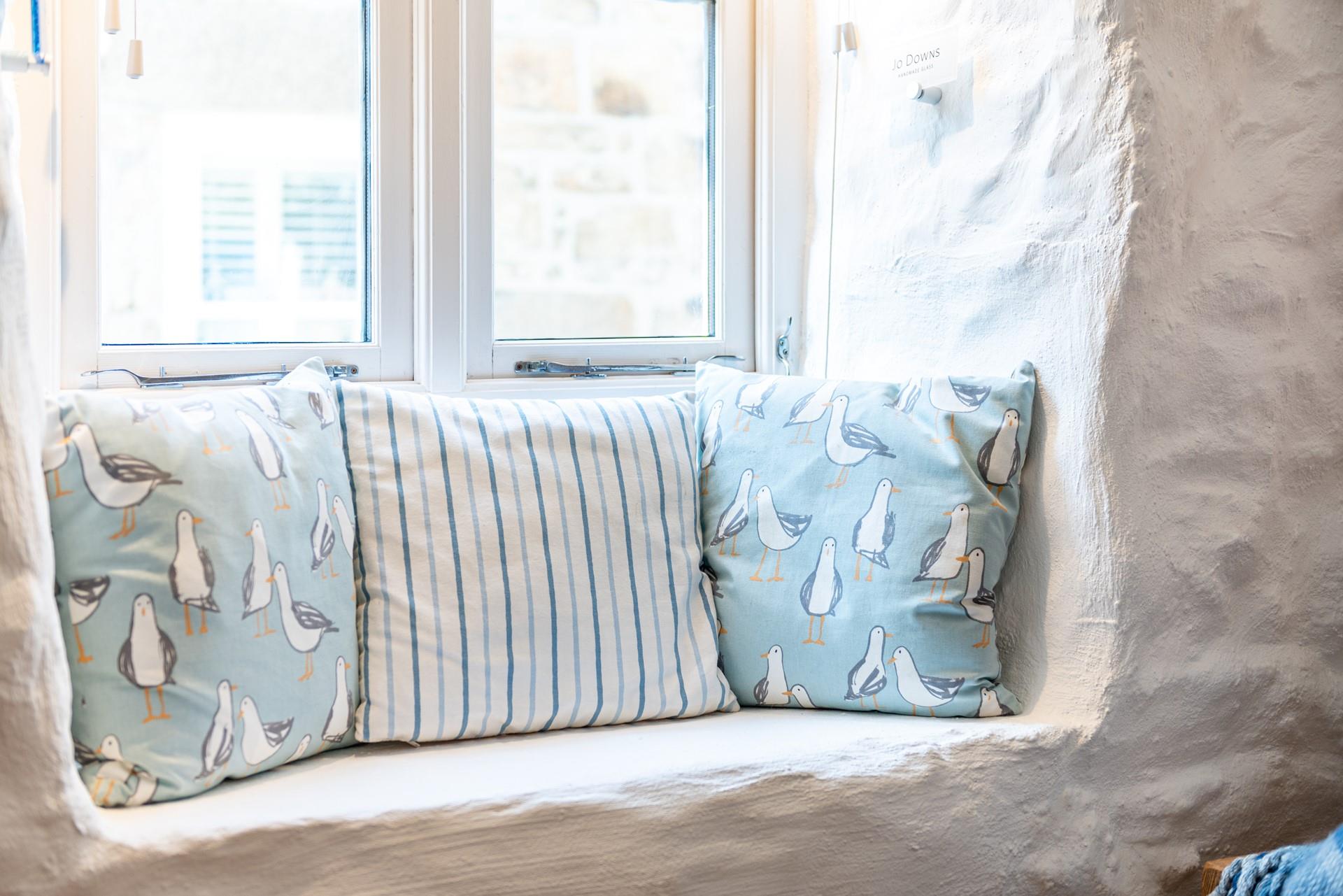 Cosy up in this adorable window seat with a mug of your favourite drink and watch the sunrise over St Ives.