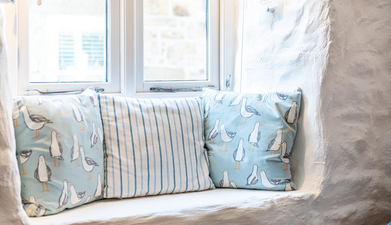 Cosy up in this adorable window seat with a mug of your favourite drink and watch the sunrise over St Ives.