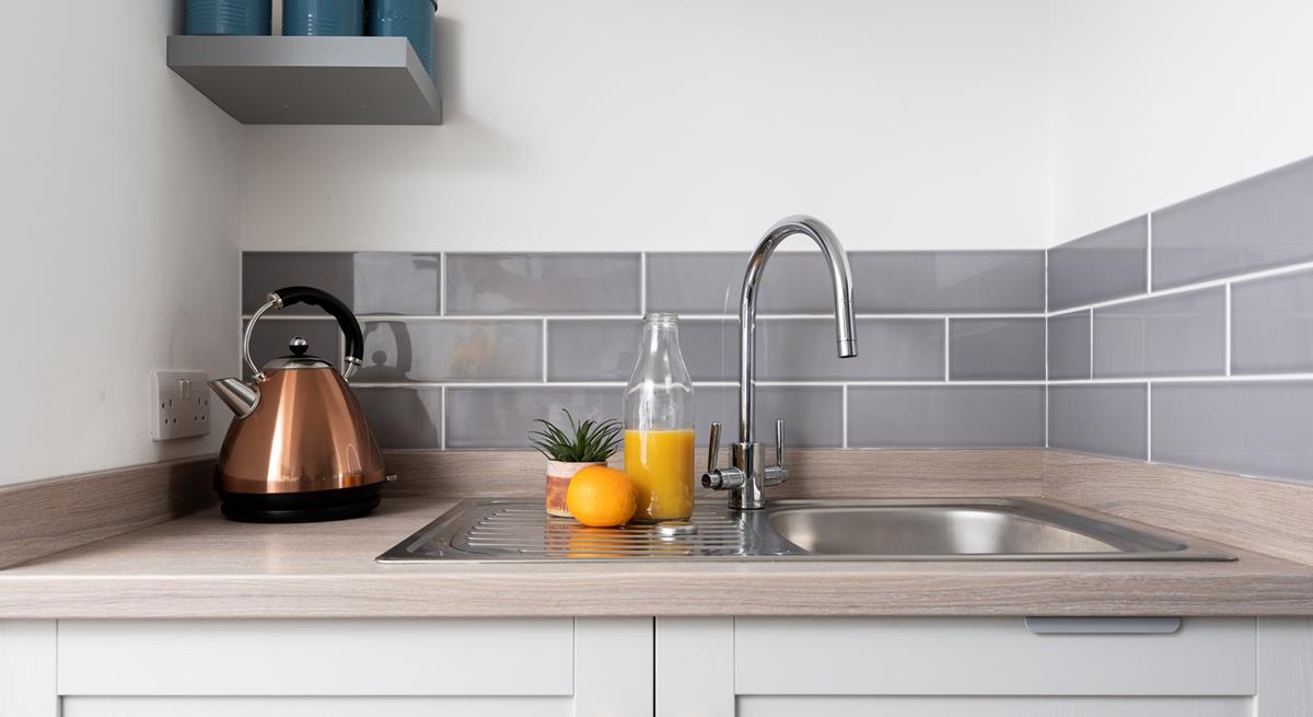 Modern and stylish, the kitchen has all you need for your stay at Little Breeze. 