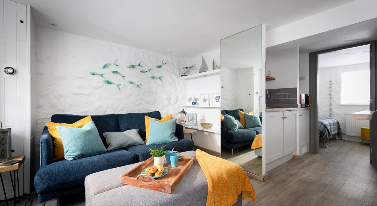 The living space is laid out in an open plan fashion for a relaxed and comfortable living environment.