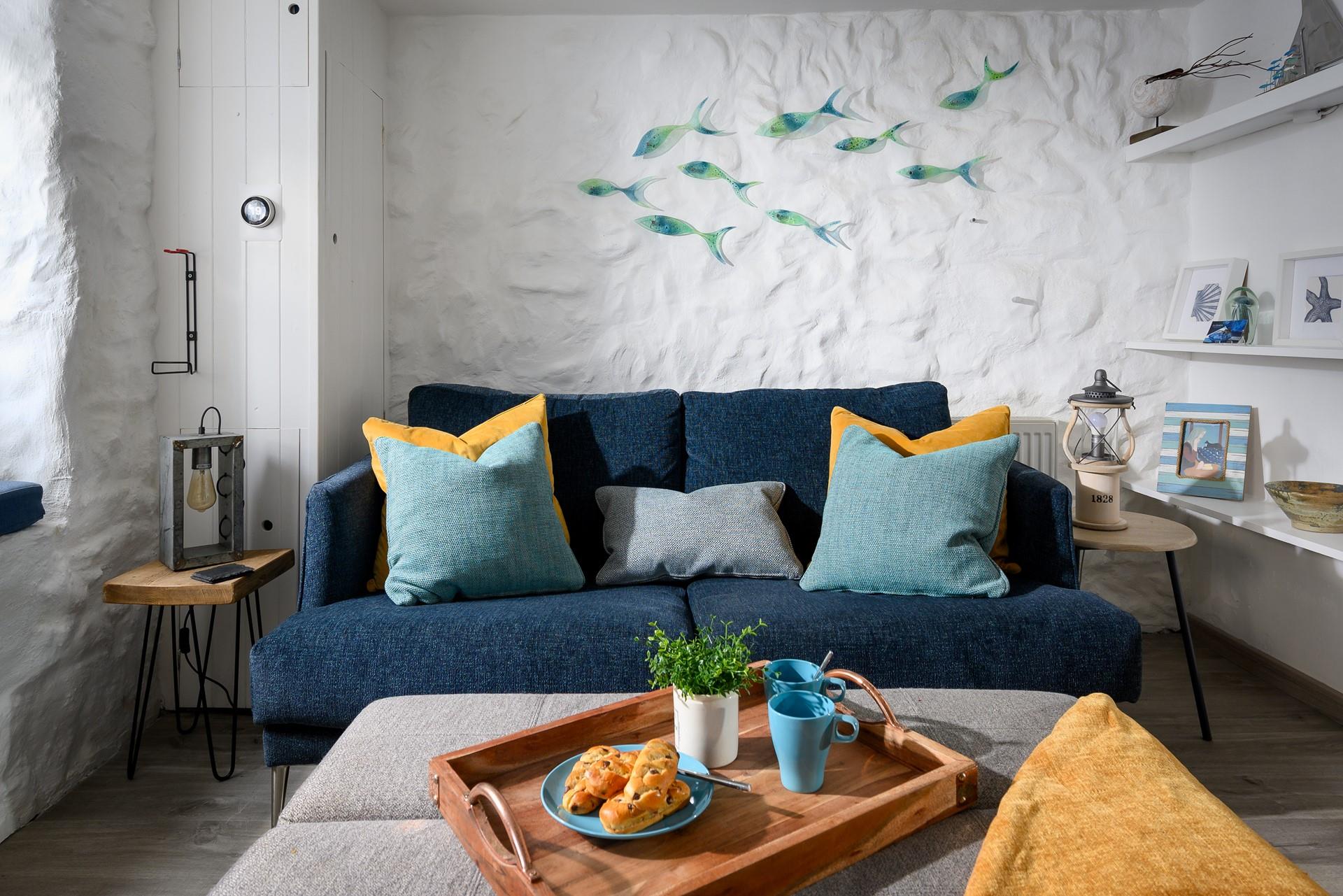 We love the nautical artwork and décor throughout the apartment. 
