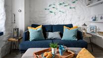 We love the nautical artwork and décor throughout the apartment. 