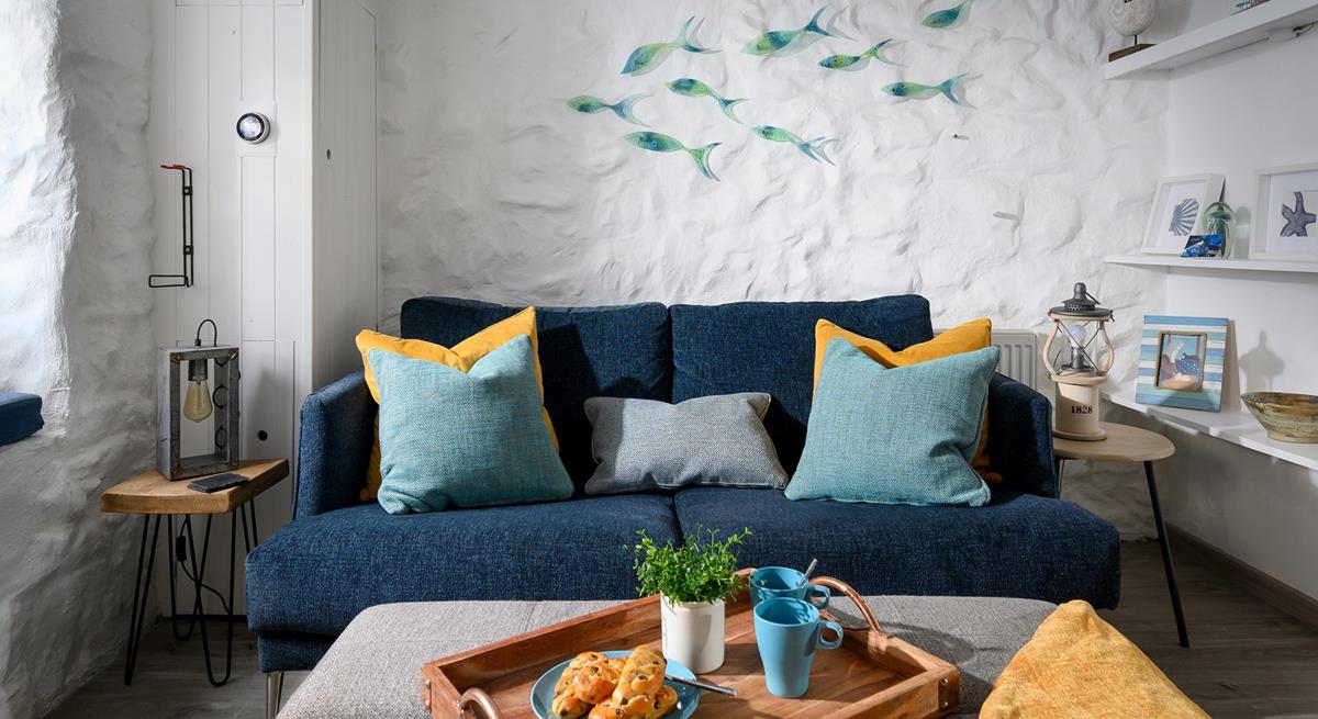We love the nautical artwork and décor throughout the apartment. 