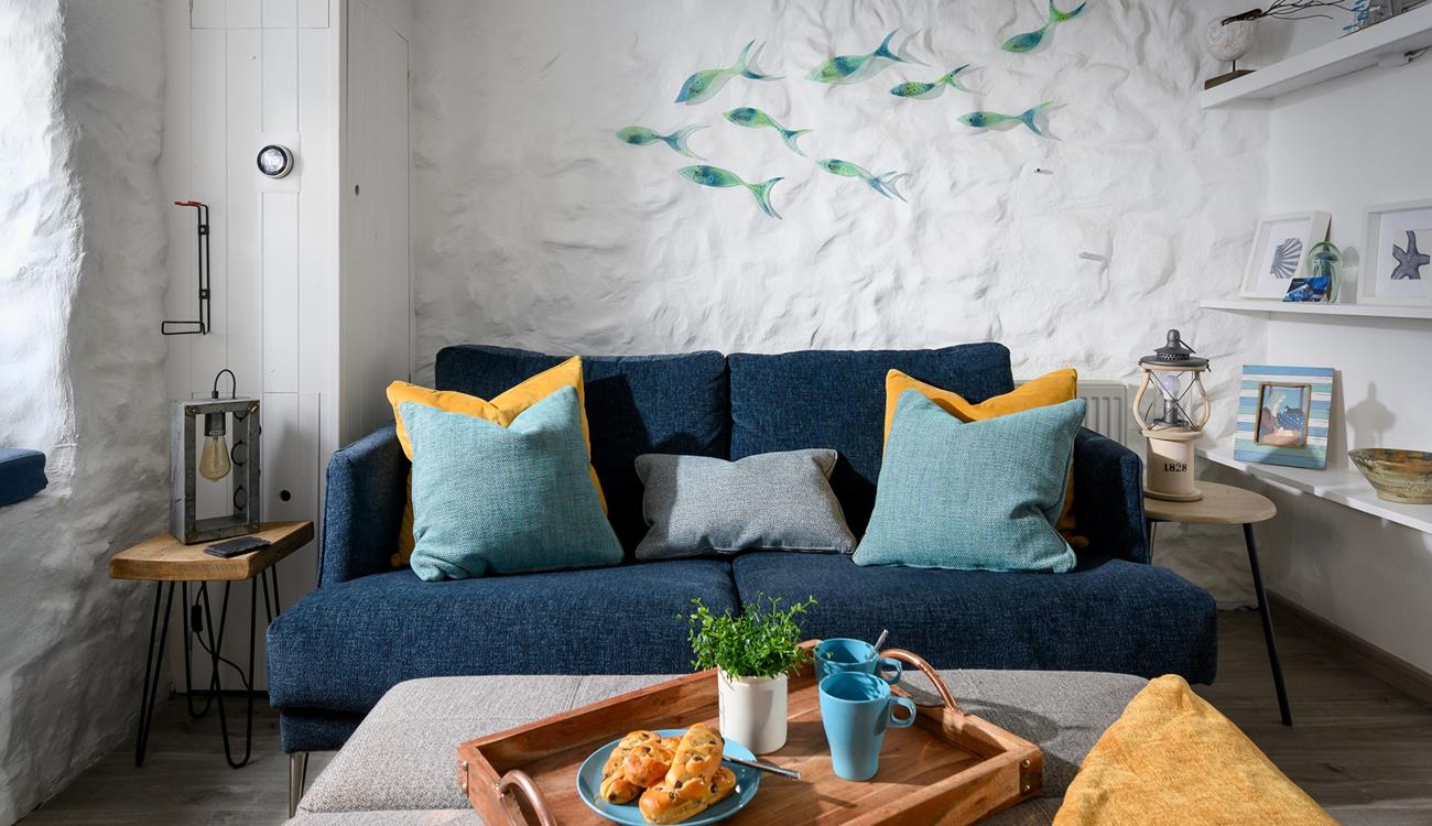 We love the nautical artwork and décor throughout the apartment. 