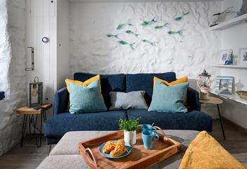 We love the nautical artwork and décor throughout the apartment. 