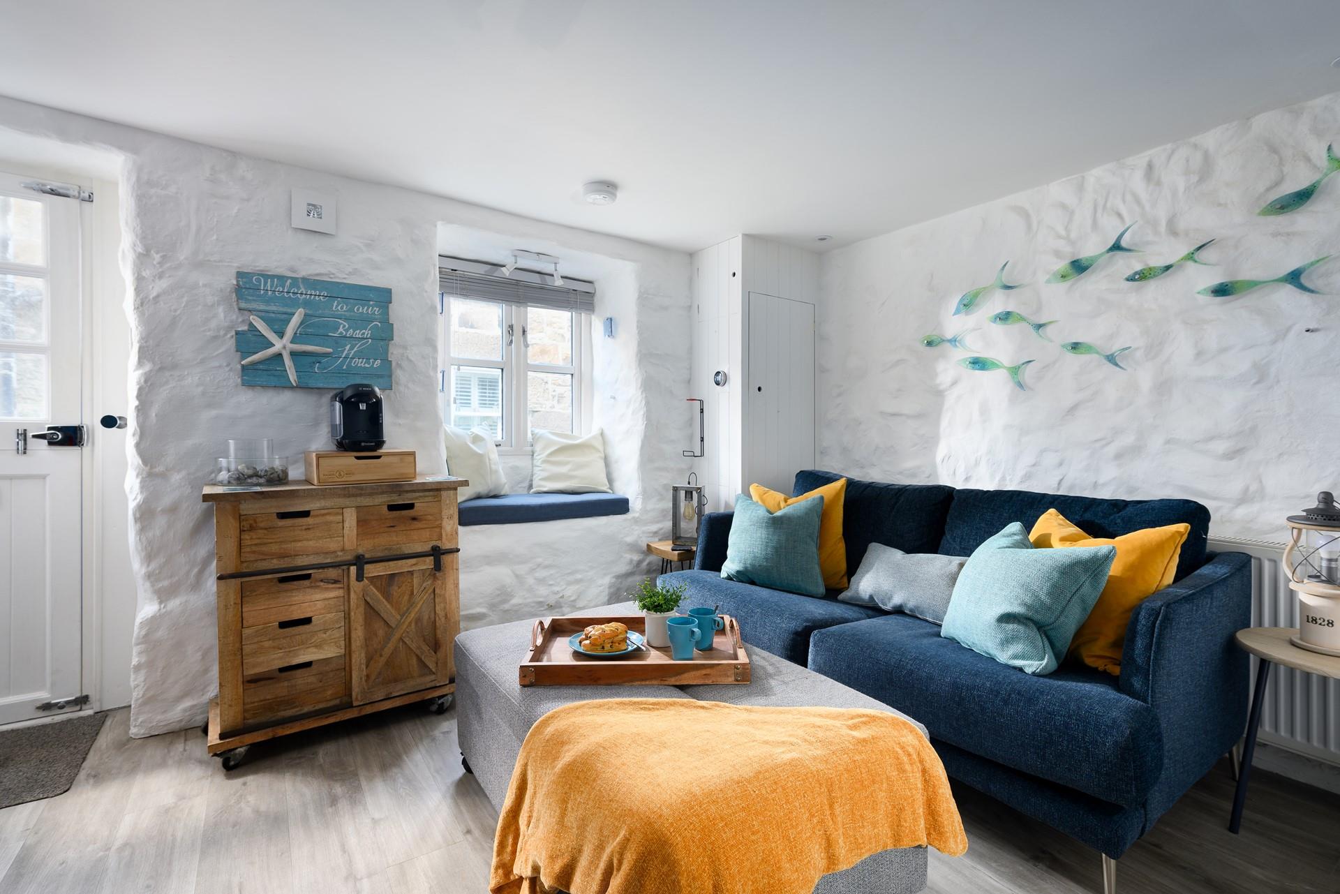 Cuddle up on the stylish leather sofa for an evening of films!