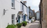 Cobblestreet Cottage is located on an enchanting street on Bunkers Hill. - Thumbnail Image