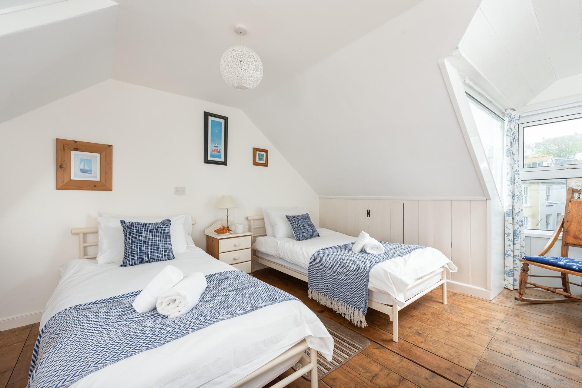 A rocking chair provides a brilliant spot for parents to read a bedtime story to children.