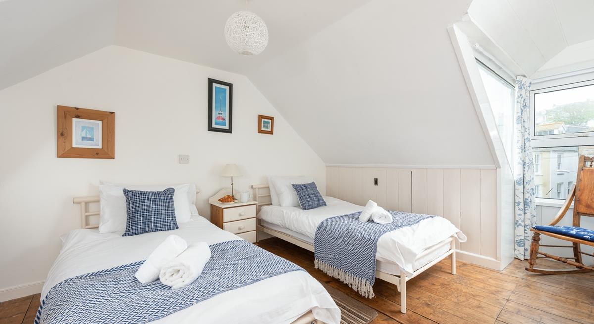 A rocking chair provides a brilliant spot for parents to read a bedtime story to children.