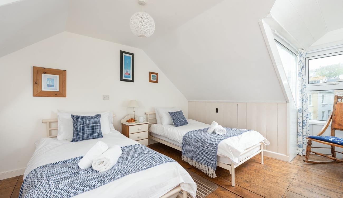 A rocking chair provides a brilliant spot for parents to read a bedtime story to children.