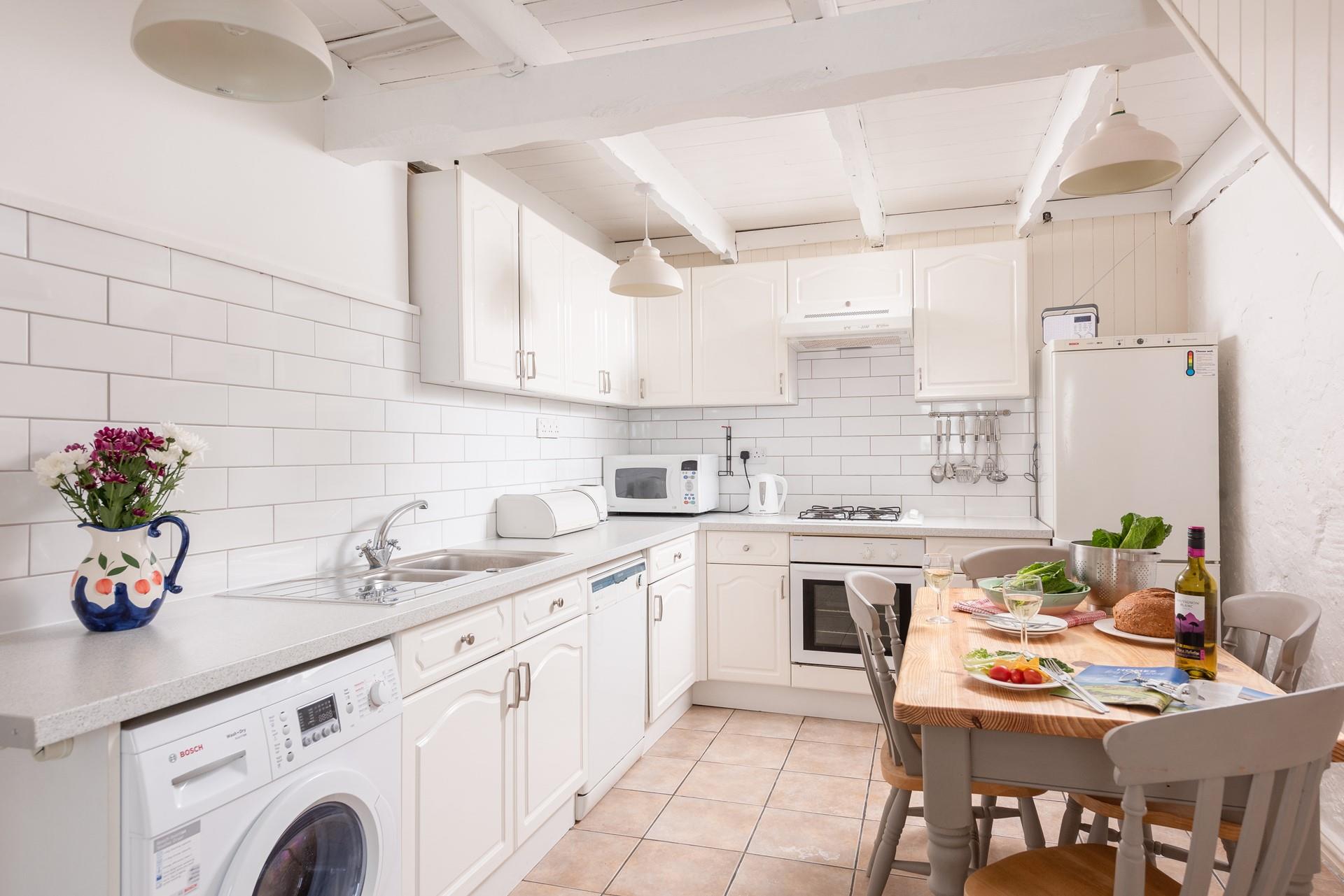 The exposed beams give the property fantastic character.