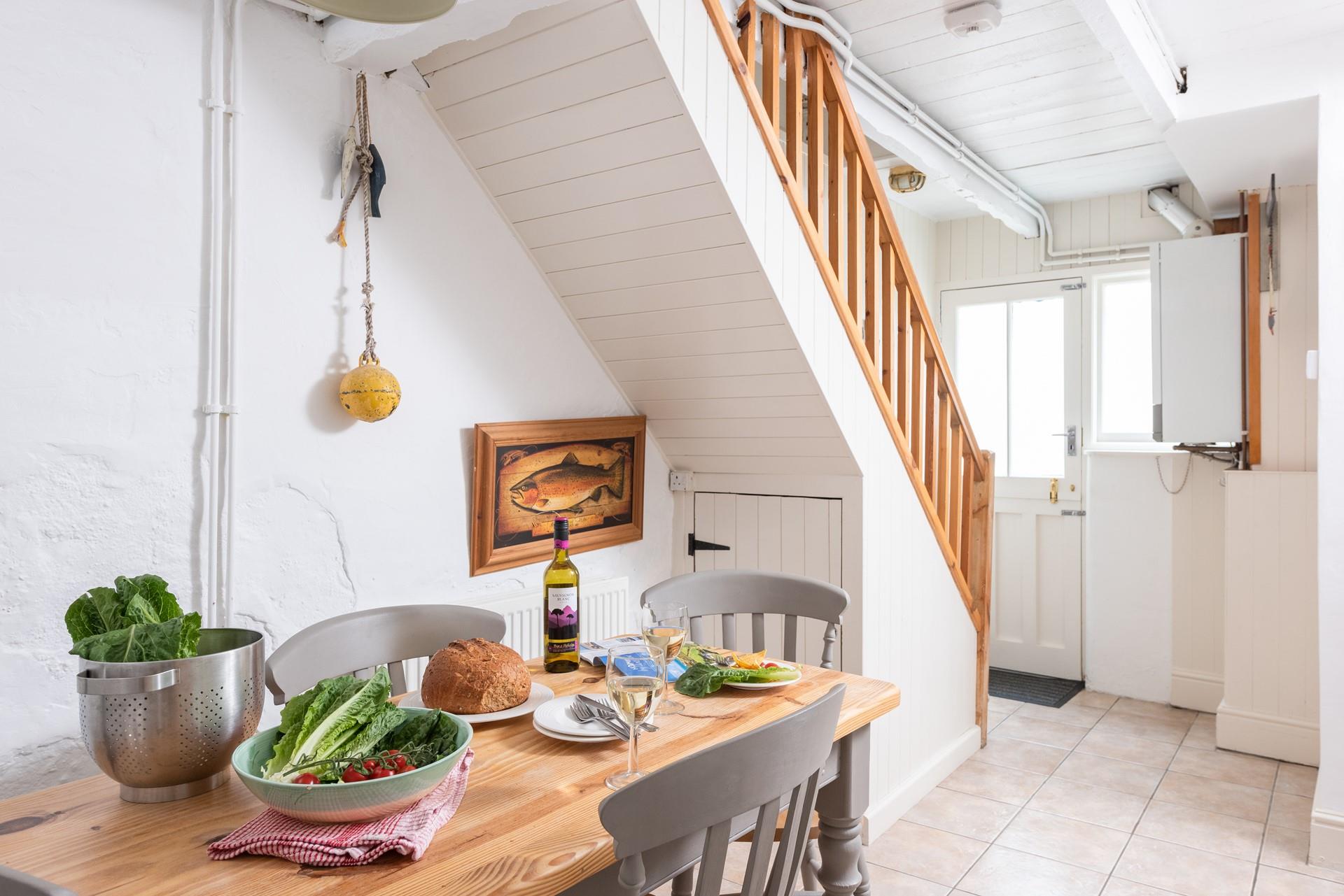 The dining area is a lovely bright space to come together and enjoy home-cooked meals as a family.