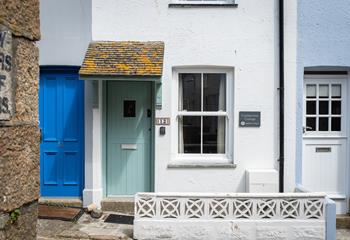 The pretty door and slate sign make the property easy to spot.