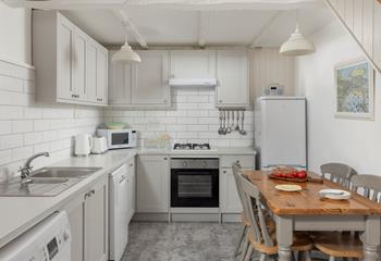 The kitchen has all you need for a relaxing stay.