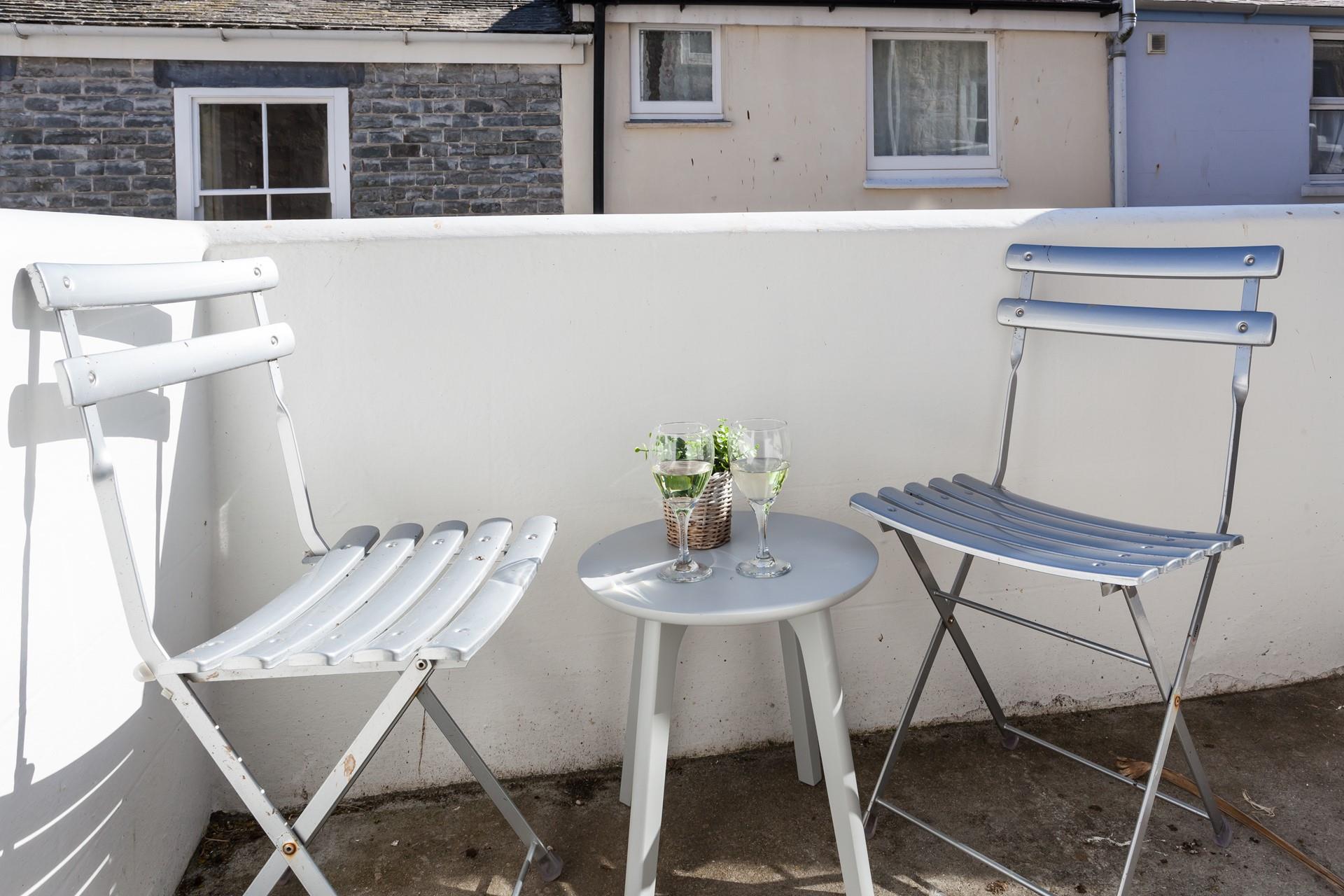 Outside seating offers a tucked-away space to enjoy a glass of something chilled and the last of the day's sunshine.