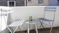 Outside seating offers a tucked-away space to enjoy a glass of something chilled and the last of the day's sunshine.