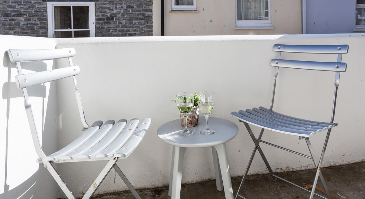 Outside seating offers a tucked-away space to enjoy a glass of something chilled and the last of the day's sunshine.