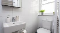 An en suite shower room offers additional privacy and space to get ready for the day ahead.