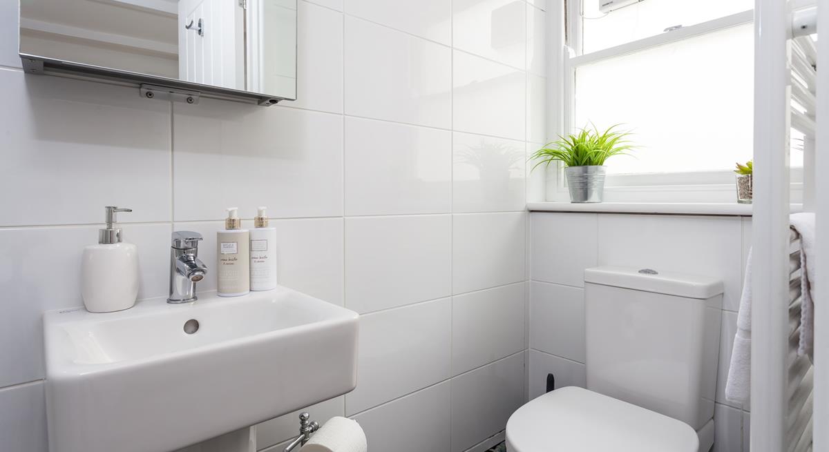 An en suite shower room offers additional privacy and space to get ready for the day ahead.
