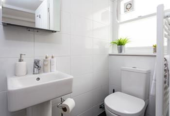 An en suite shower room offers additional privacy and space to get ready for the day ahead.