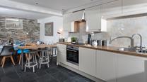 The open plan kitchen and dining area is a beautiful space for relaxing with your loved ones.
