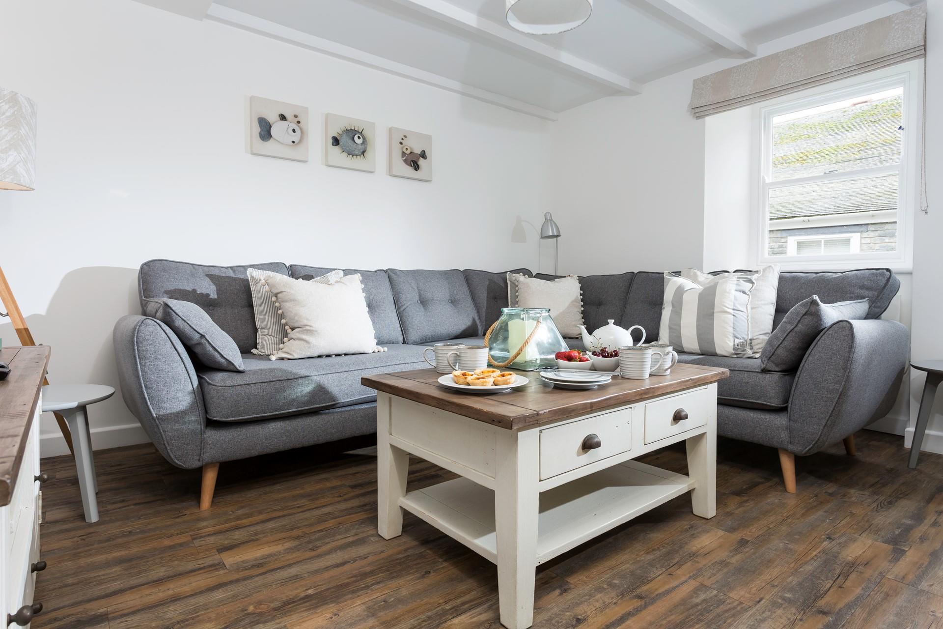 A calming colour palette makes the sitting room the perfect place to relax and unwind.
