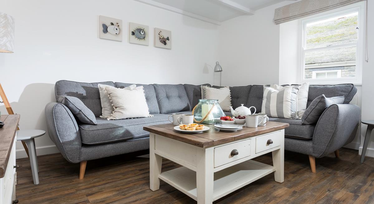 A calming colour palette makes the sitting room the perfect place to relax and unwind.