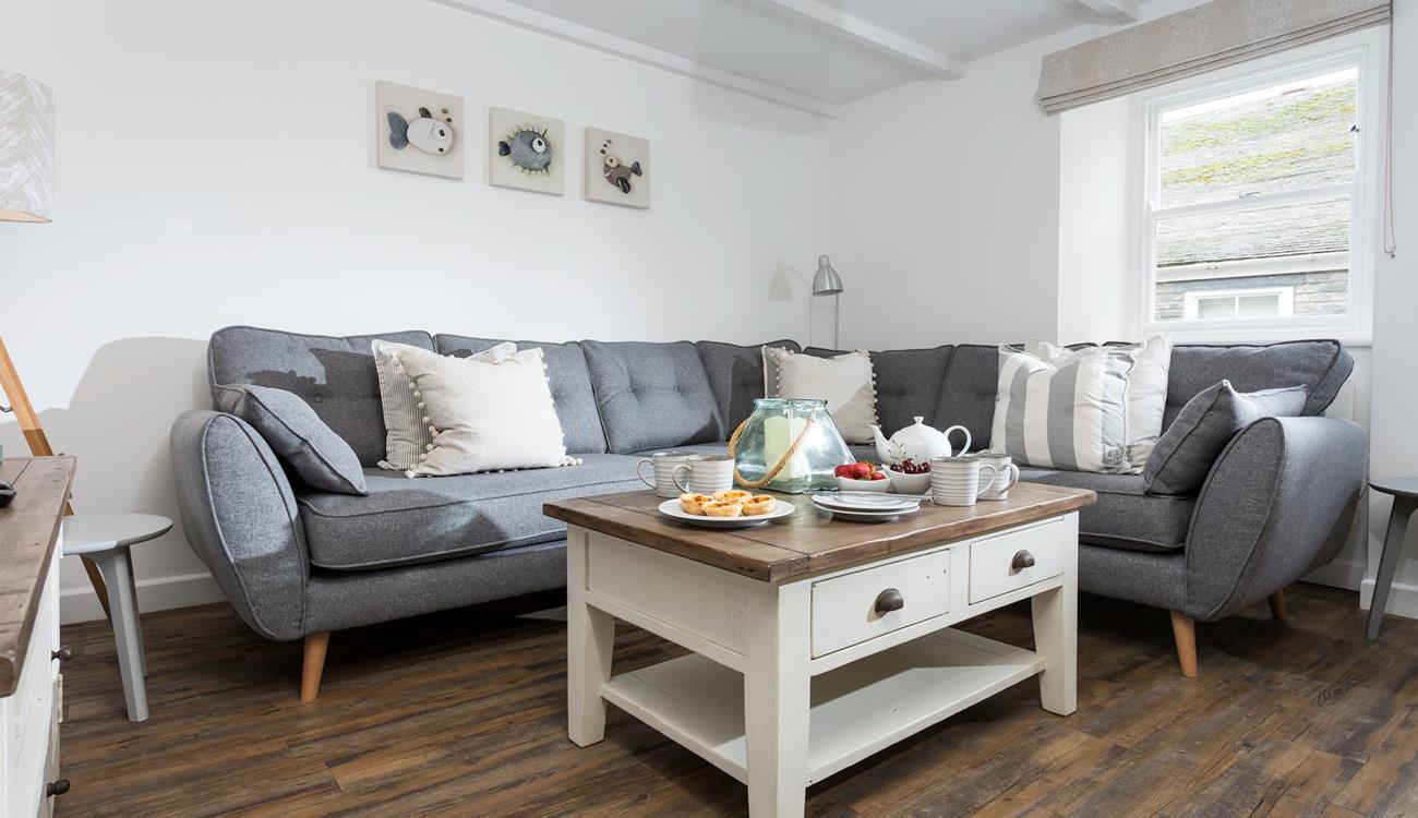 A calming colour palette makes the sitting room the perfect place to relax and unwind.