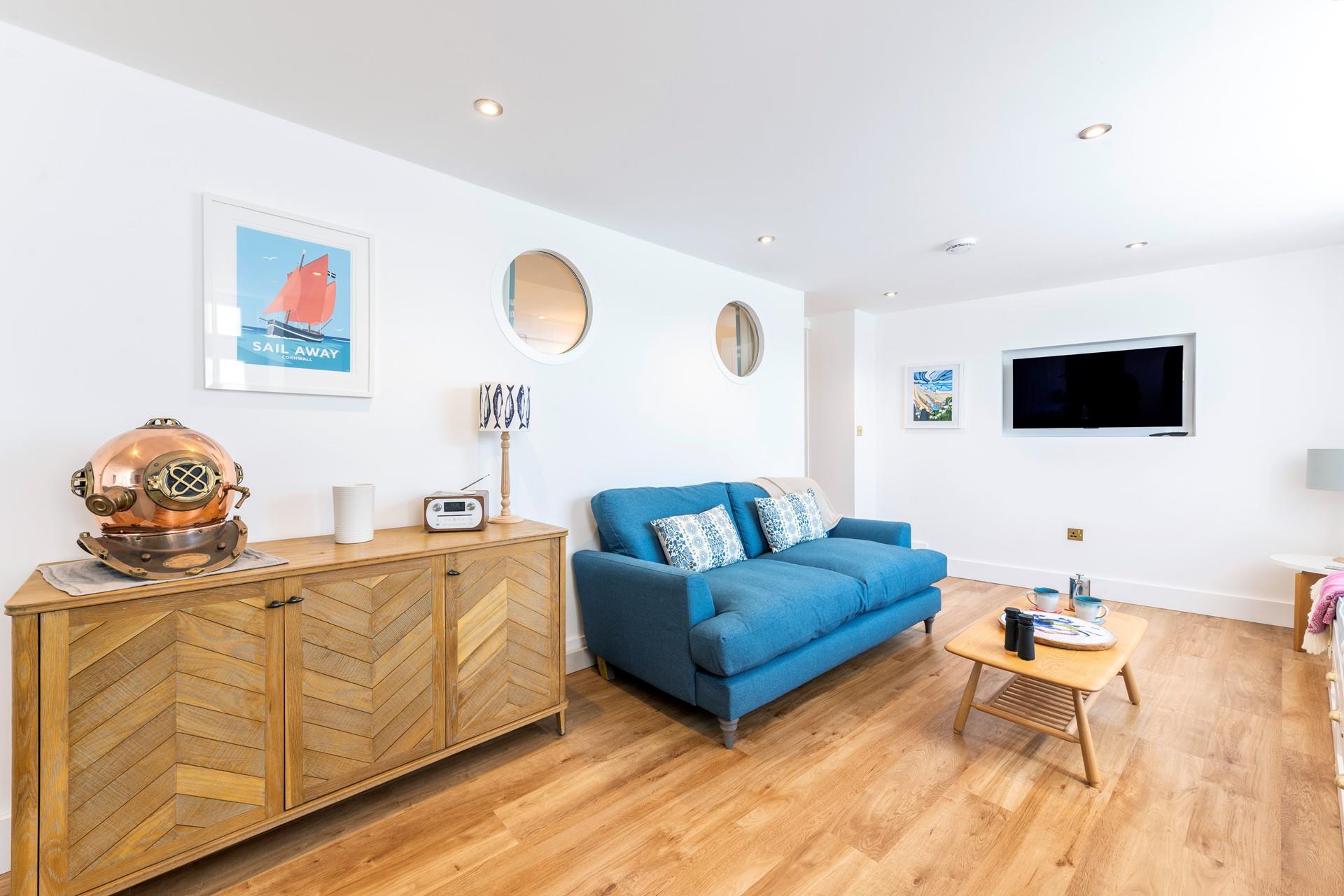 The apartment has a nautical theme reflecting the close proximity to the ocean.