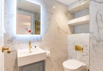 The modern en suite is the perfect space to get ready in the morning.
