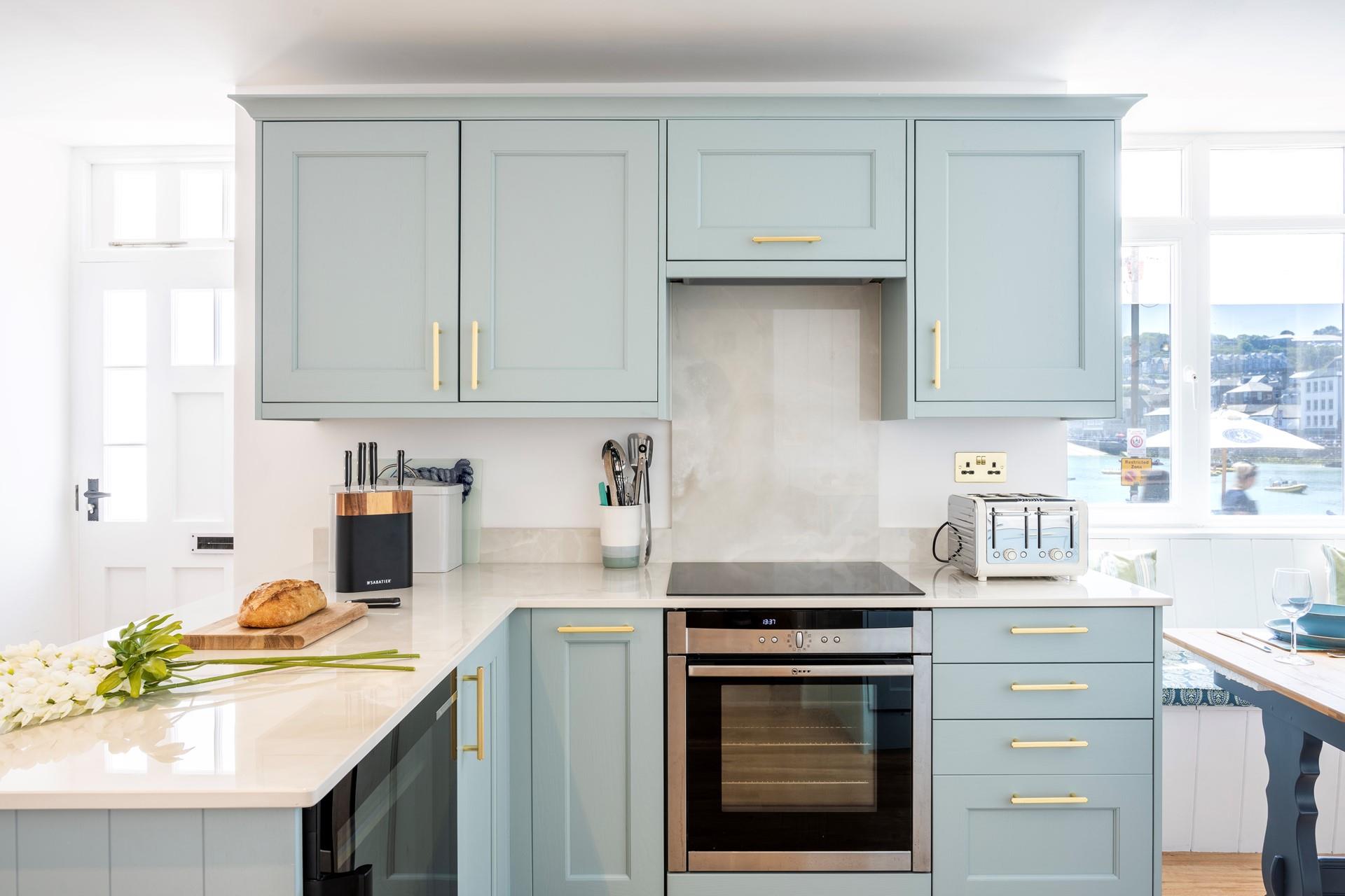 The kitchen is modern and stylish, perfect for cooking up a storm.