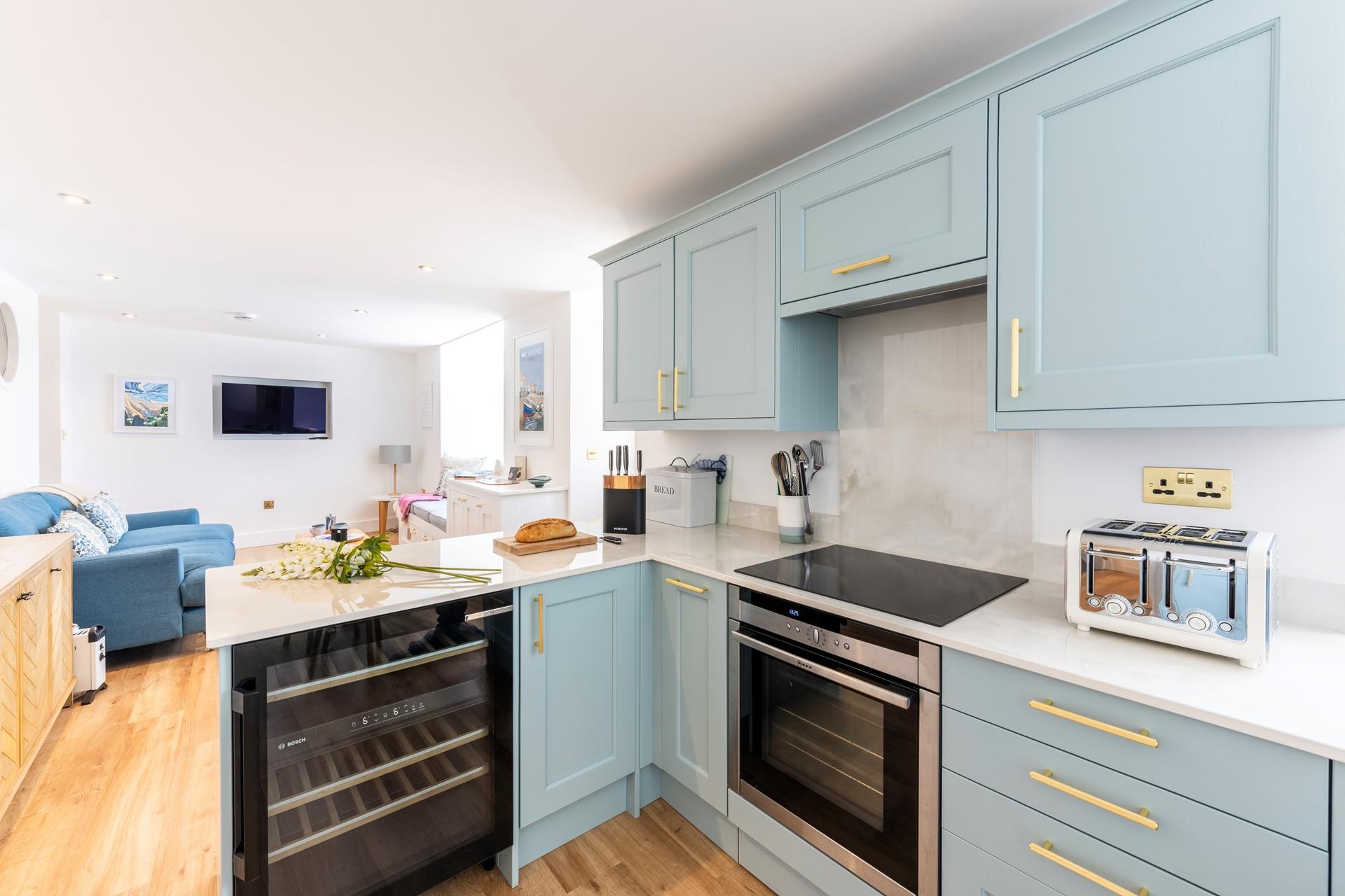 The added luxury of a wine cooler is perfect for evenings in!