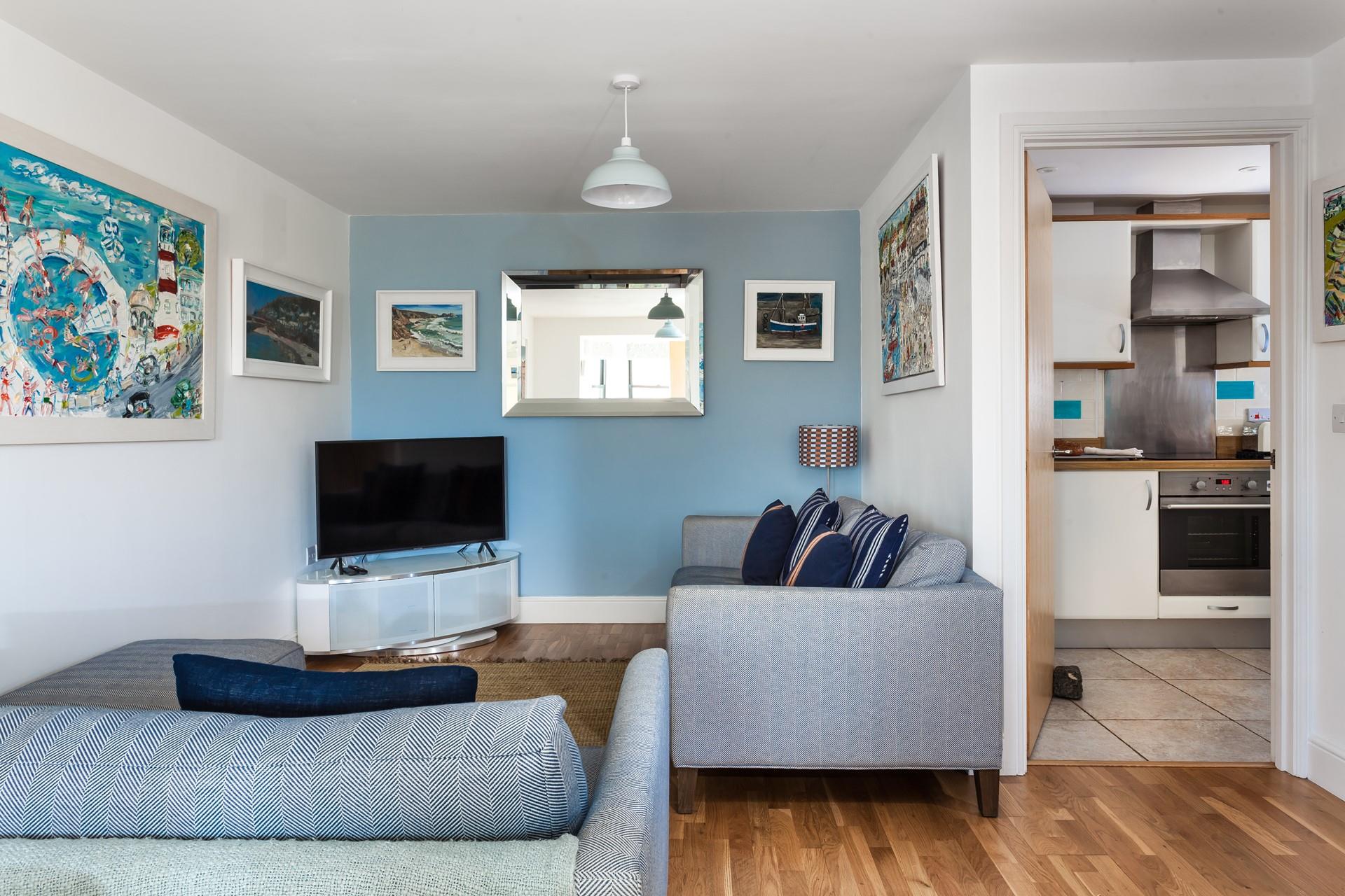 The cosy living room provides a space for you to relax in the evenings.