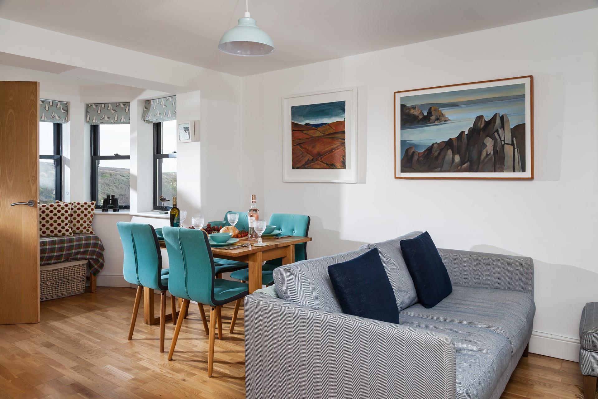 Open a bottle of wine and sit in the window seat with the sound of the waves crashing in the background.