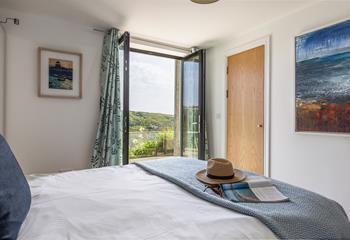 Wake up to stunning views from bedroom 1.
