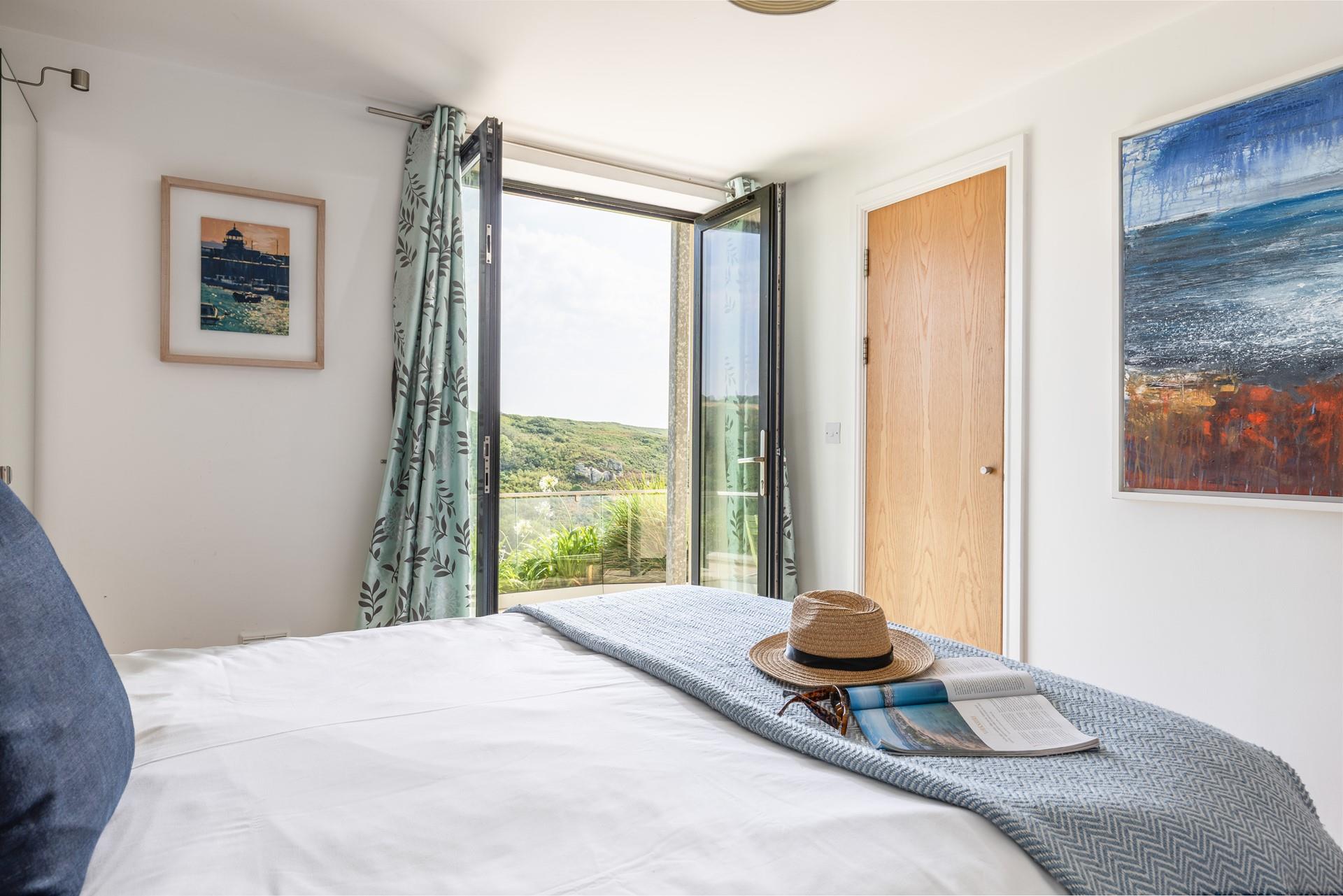 Wake up to stunning views from bedroom 1.