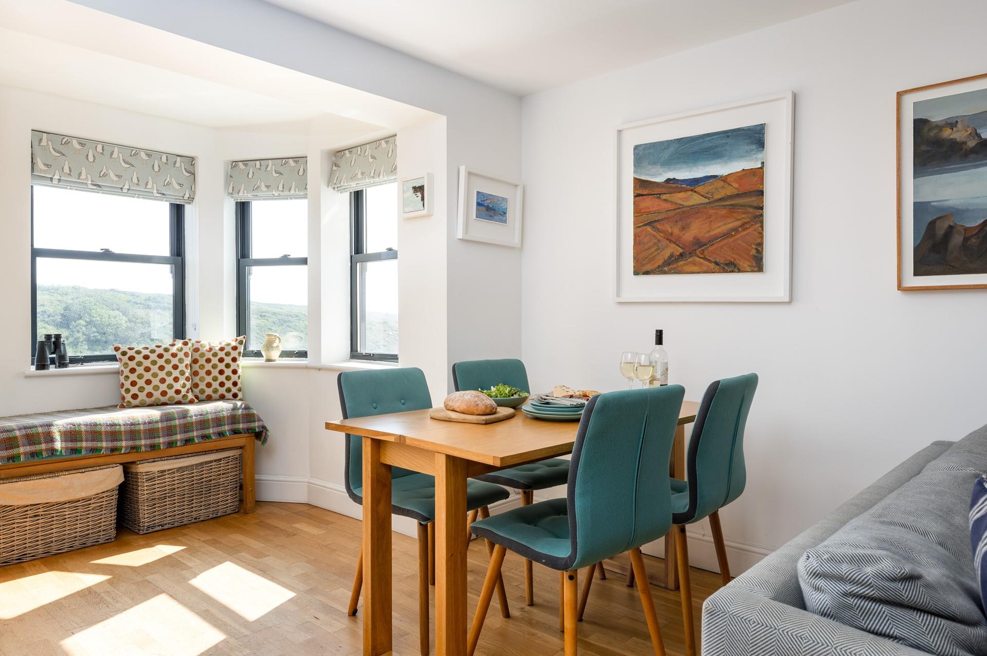 The dining area boasts beautiful sea views.