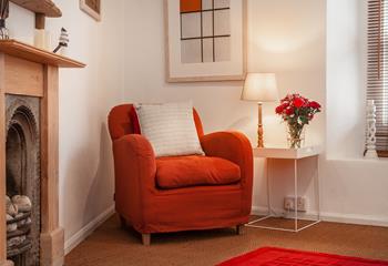 The armchair is the perfect place to tuck yourself away with a hot chocolate and a good book.