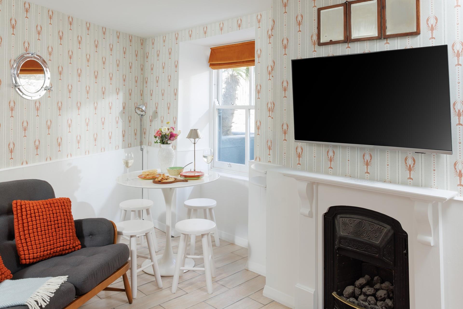 The dining area offers ample room for the whole family to gather together for meals.