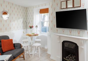 The dining area offers ample room for the whole family to gather together for meals.