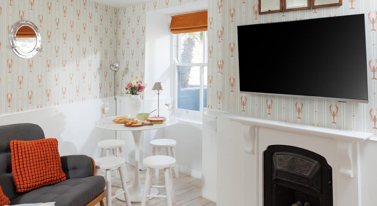 The dining area offers ample room for the whole family to gather together for meals.