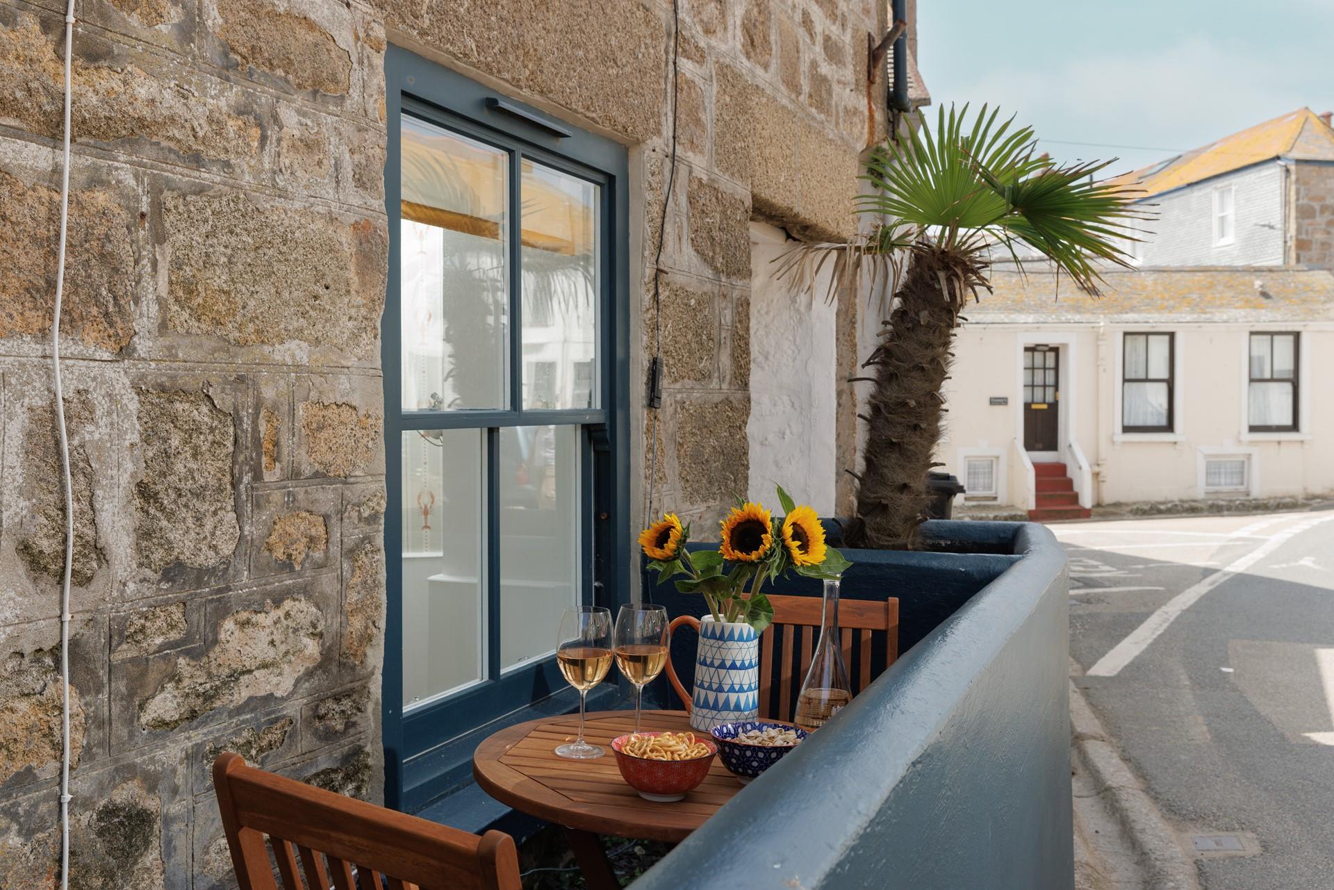 Soak up the sun with a cold glass of wine.